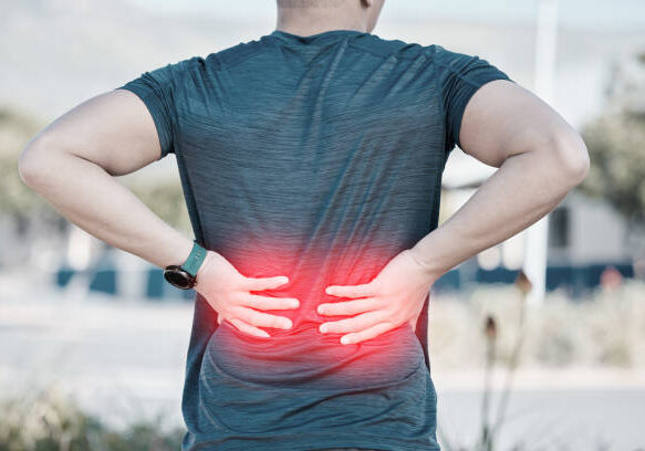 Back pain, red fitness and man running exercise or sports injury, emergency and healthcare risk. Medical, spine and athlete person with anatomy problem for training, cardio or runner workout overlay